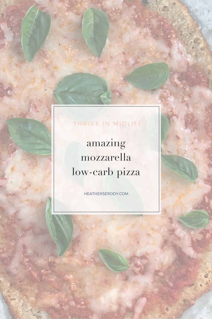 amazing mozzarella low carb pizza: just 2 carbs per 1/2 pizza! So easy to make. now you can feel good about Friday night pizza night. #keto